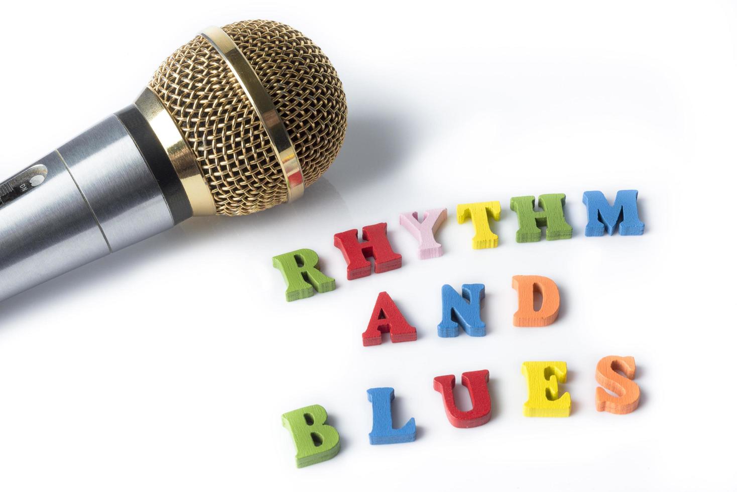 Microphone on a white background with the words the RHYTHM and BLUES photo