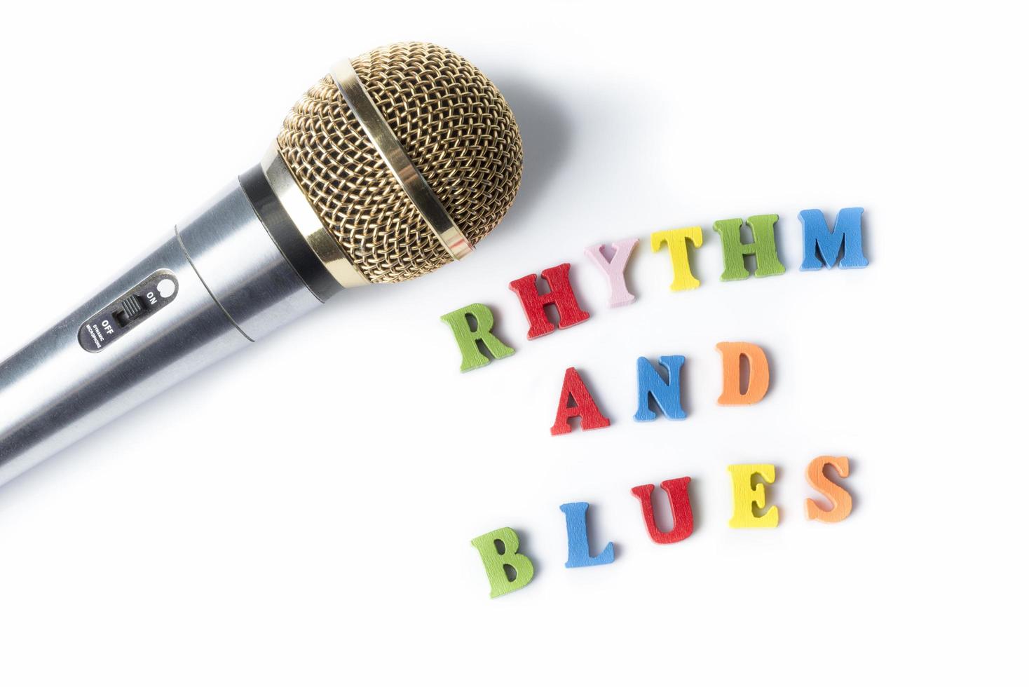 Microphone on a white background with the words the RHYTHM and BLUES photo