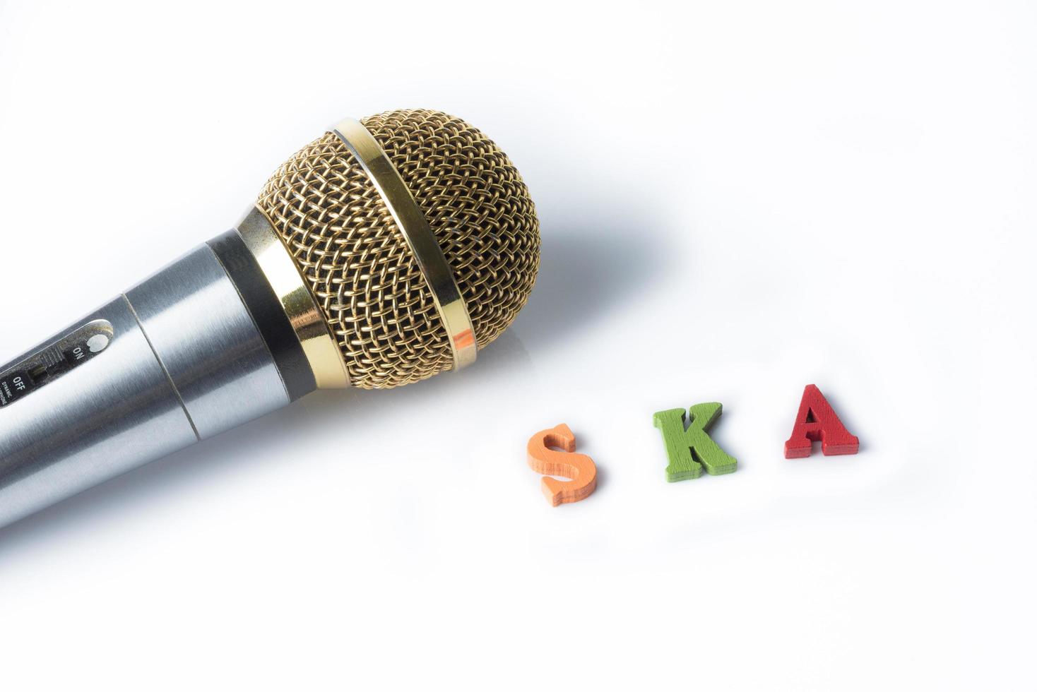 Microphone on a white background with the words ska photo