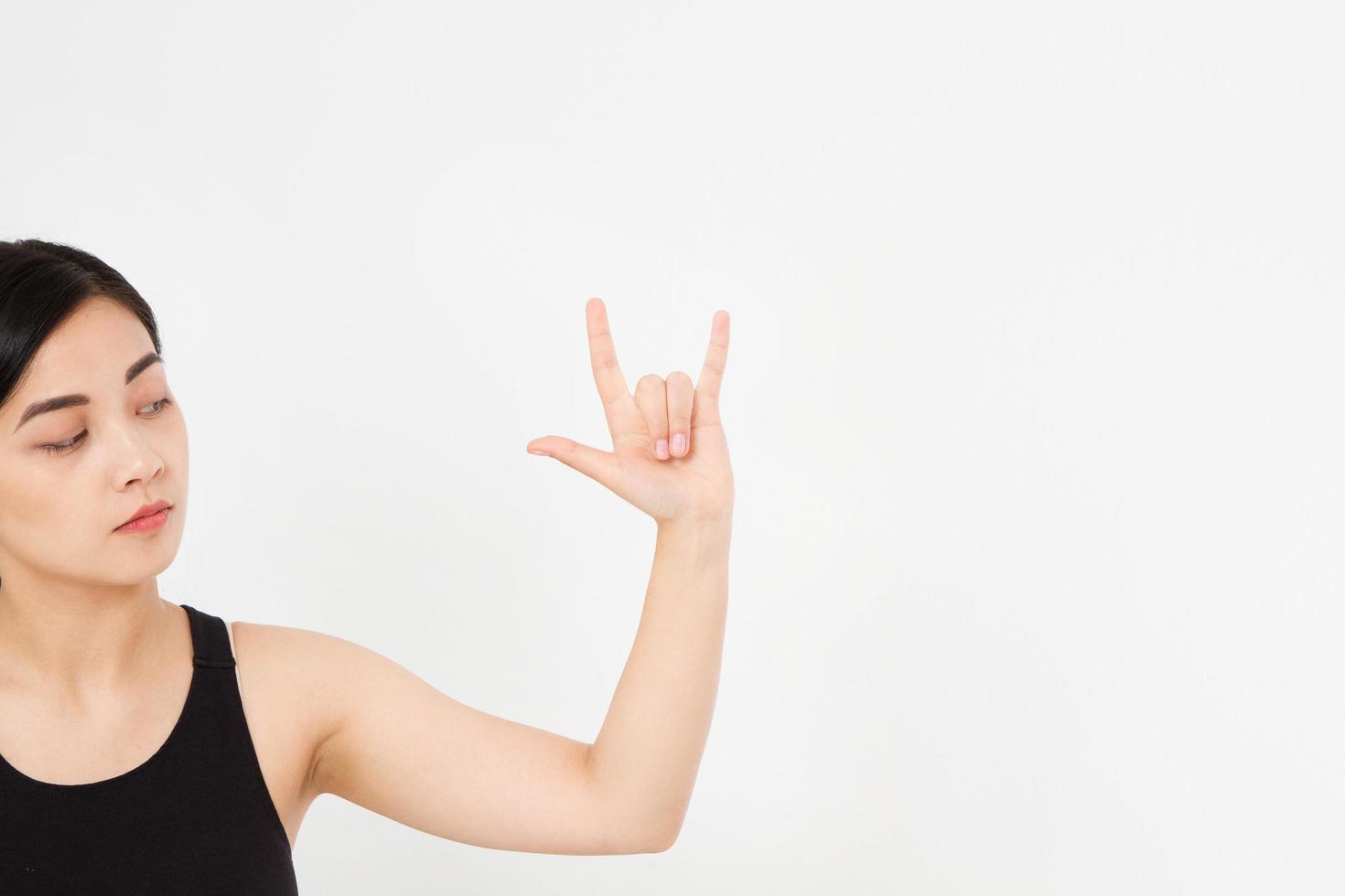 asian japanese hand making the heavy metal isolated white background. afro american hand. Mock up. Copy space. Template. Blank. photo