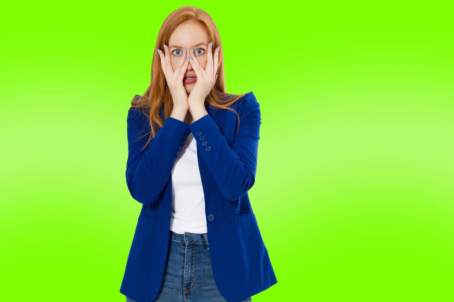 Woman do face palm, girl make facepalm, female migraine, head pain, bad feeling, tired woman - green background photo