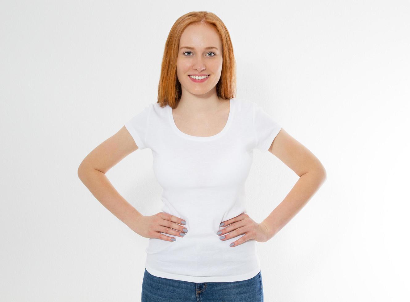 Beautiful happy red hair girl in white t-shirt isolated. Pretty smile red head woman in tshirt mock up, blank. photo