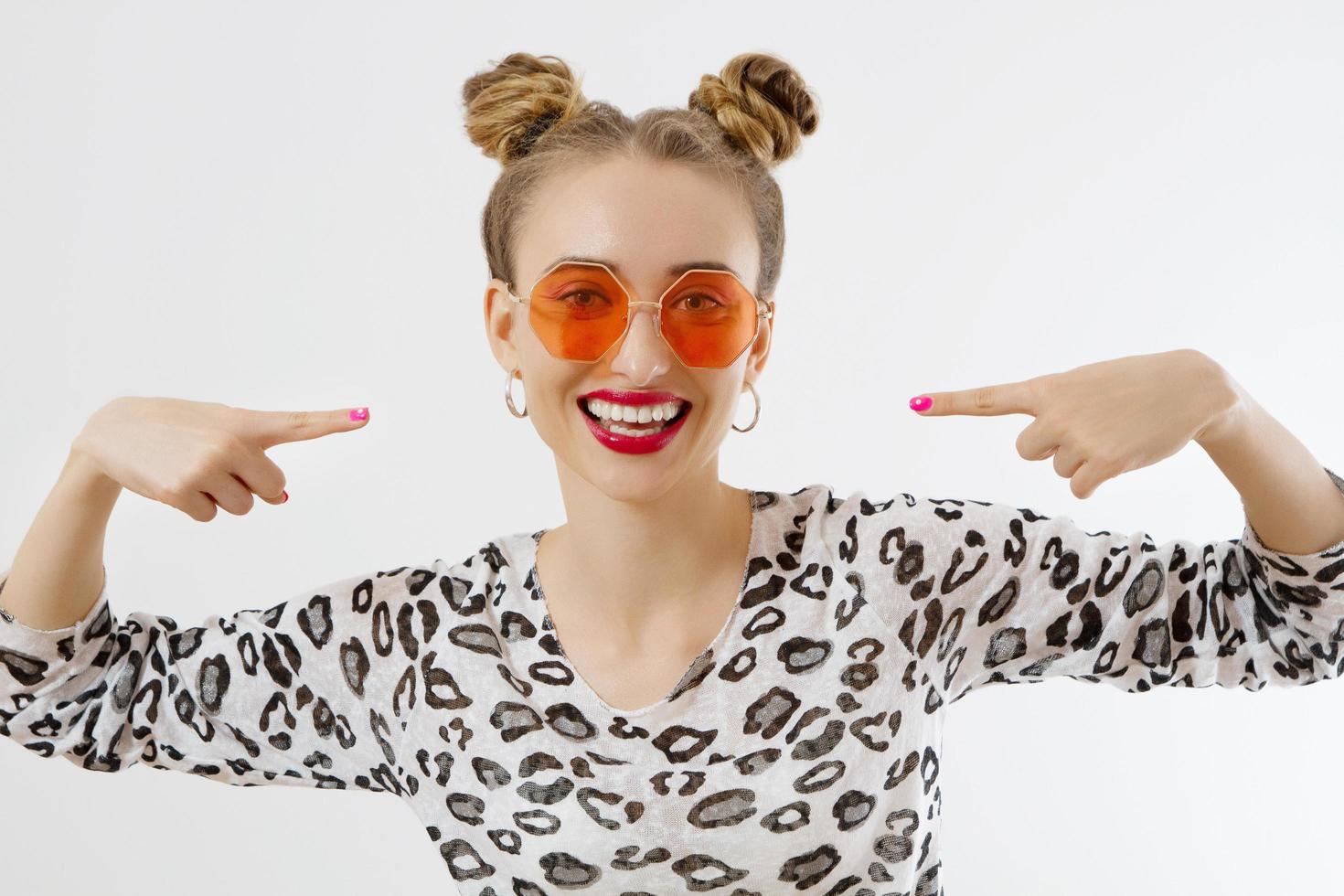 Close-up woman face. Fashion female closeup in trendy clothes isolated on white background. Summer fun time and summertime accessories. Funny girl. photo