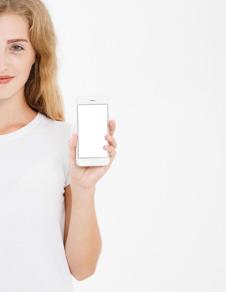 cropped portrait woman hold blank screen cell phone isolated on white background. Arm holding smartphone, copy space photo