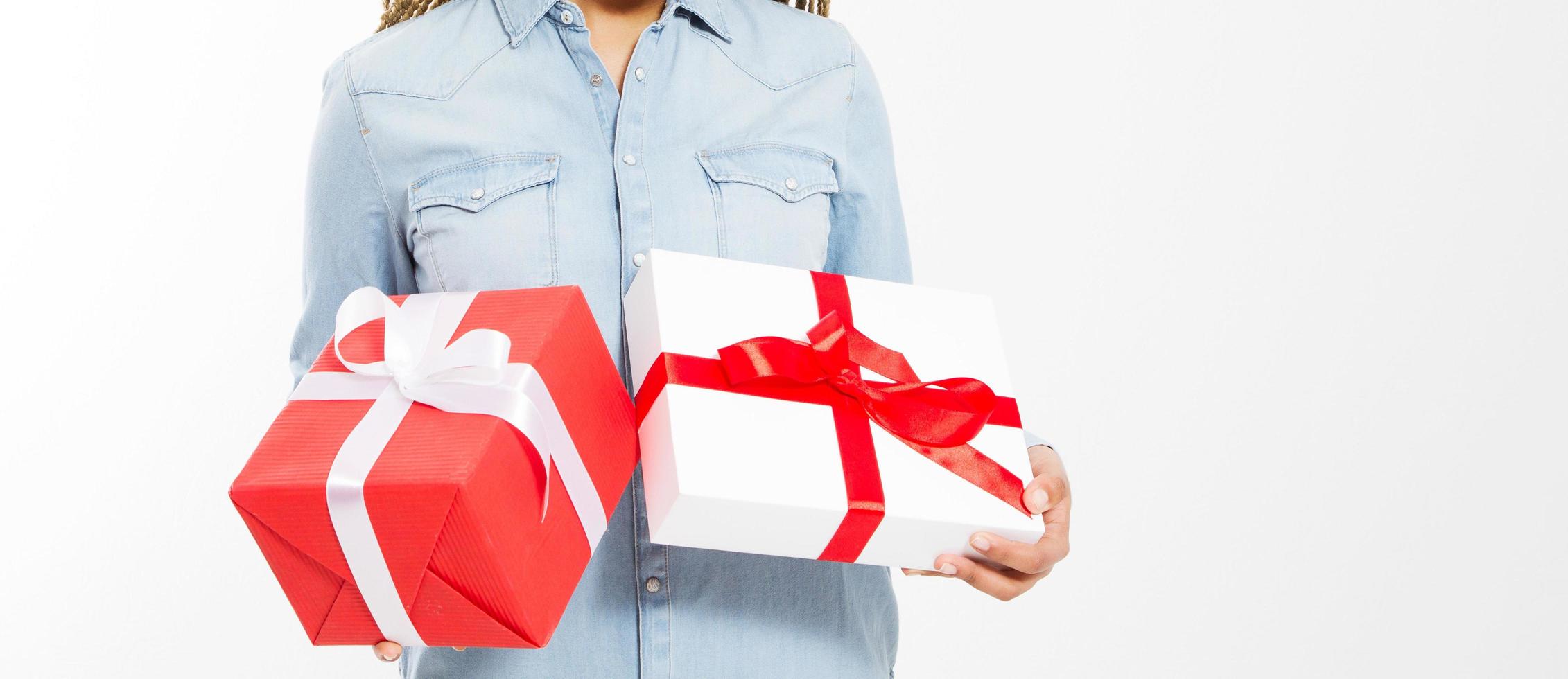 female hand hold gift boxes isolated on white background,woman and presents photo