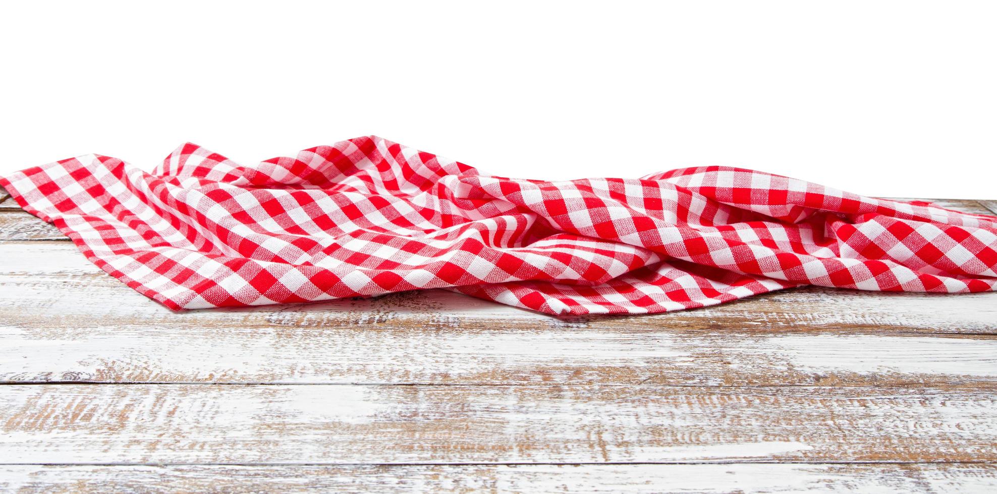 chekered tablecloth on empty table isolated on white background copy space photo