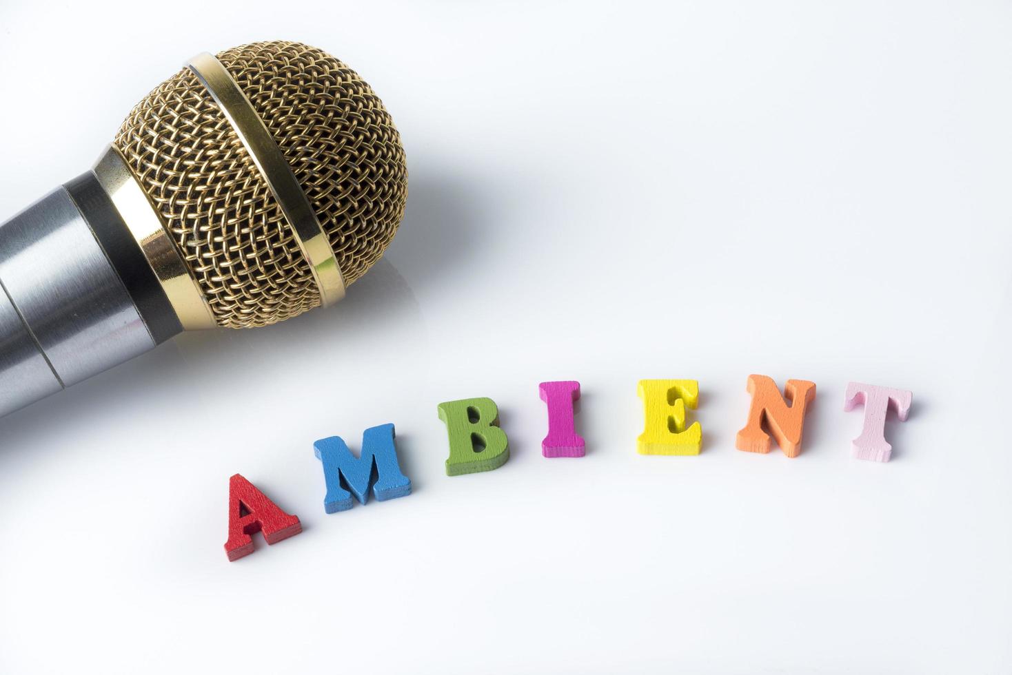 Microphone on a white background, close-up photo