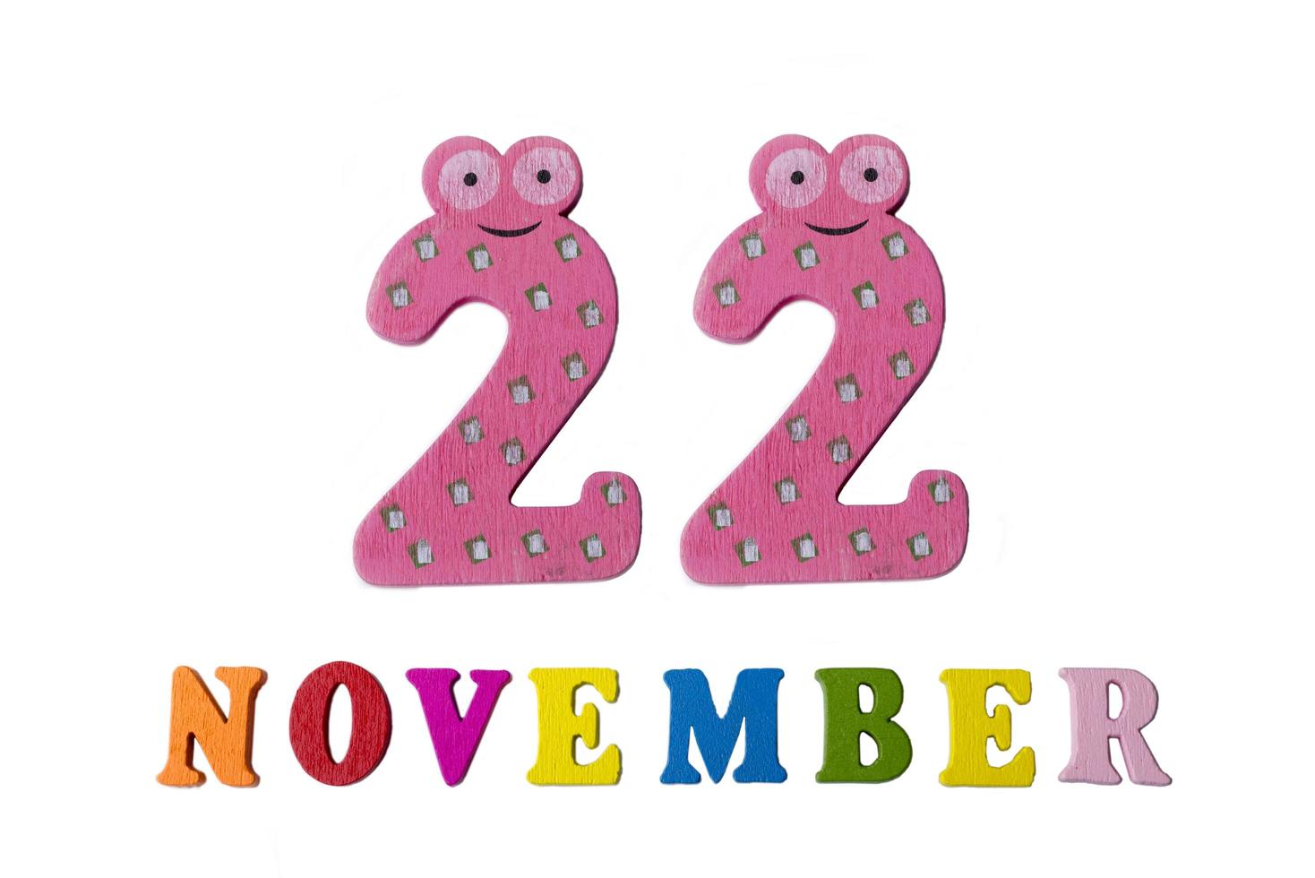 November 22 on white background, numbers and letters. photo