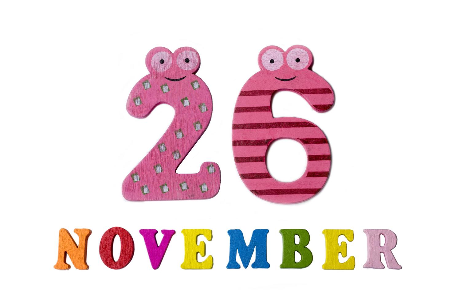 November 26 on white background, numbers and letters. photo