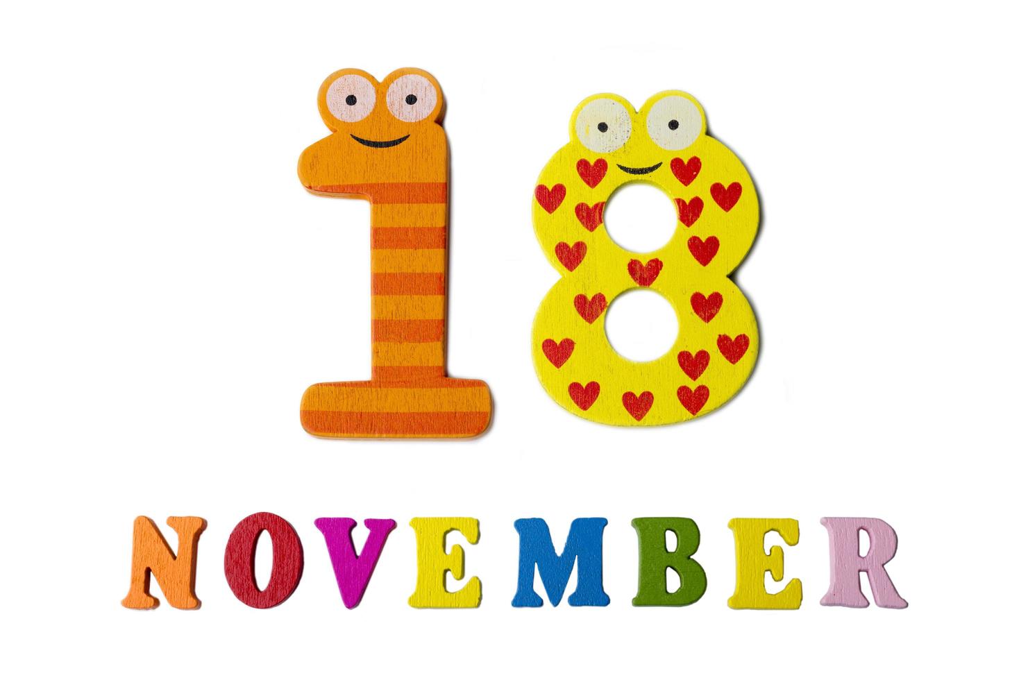 November 18 on white background, numbers and letters. photo