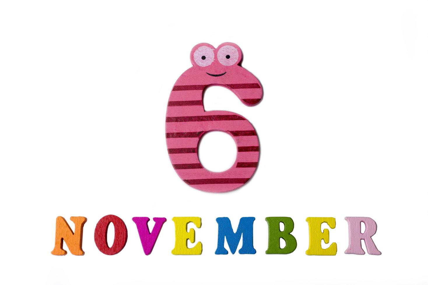 November 6 on white background, numbers and letters. photo