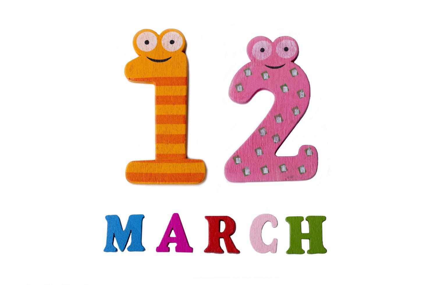 March 12 on white background, numbers and letters. photo