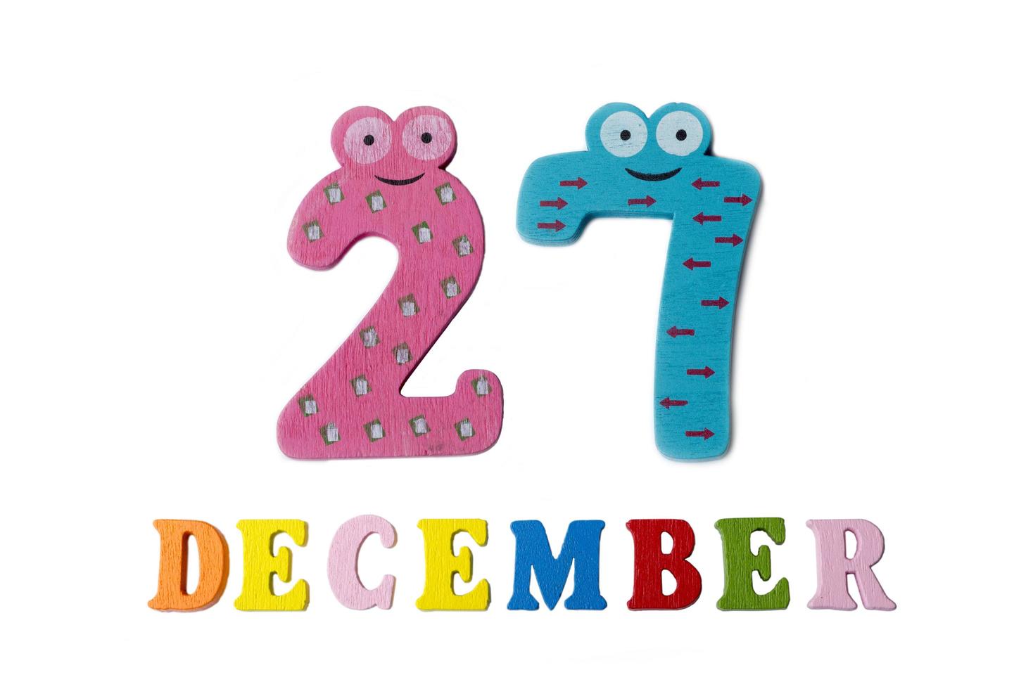 December 27 on white background, numbers and letters. photo