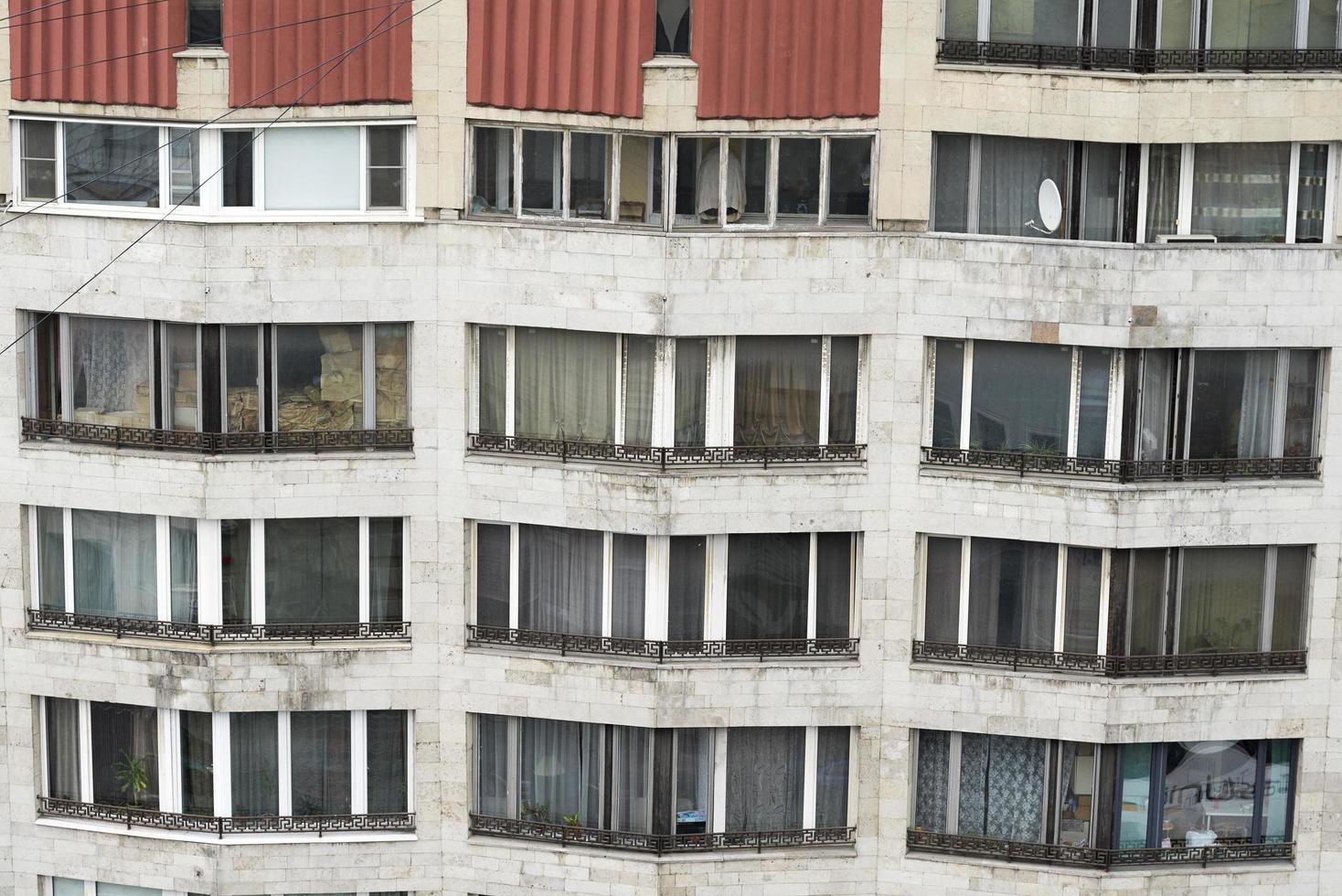 Windows of a multi-storey residential building. photo