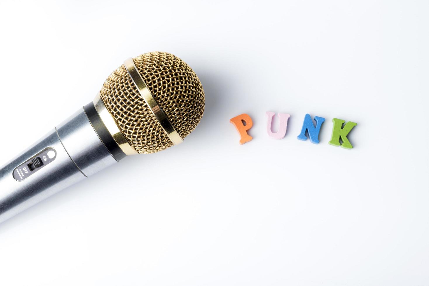 Microphone on a white background, close-up. photo