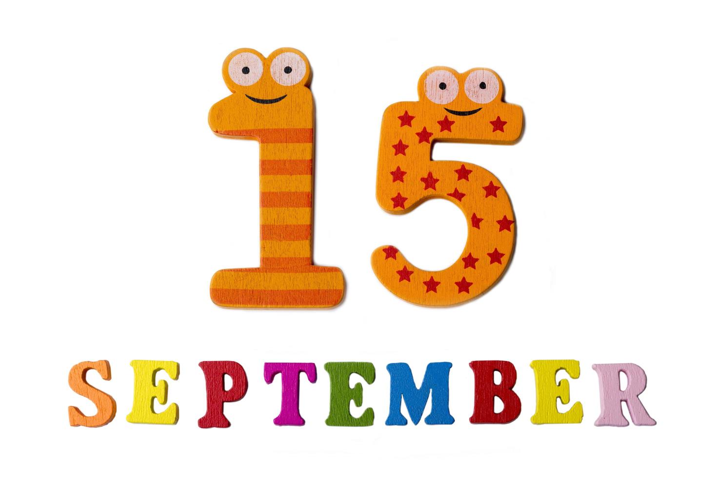 September 15 on white background, letters and numbers. photo