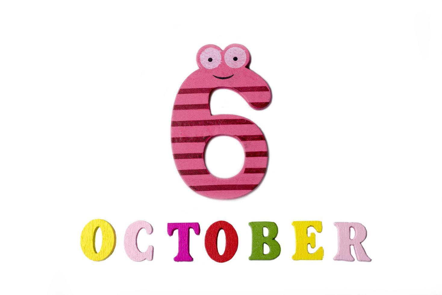 October 6 on white background, numbers and letters. photo