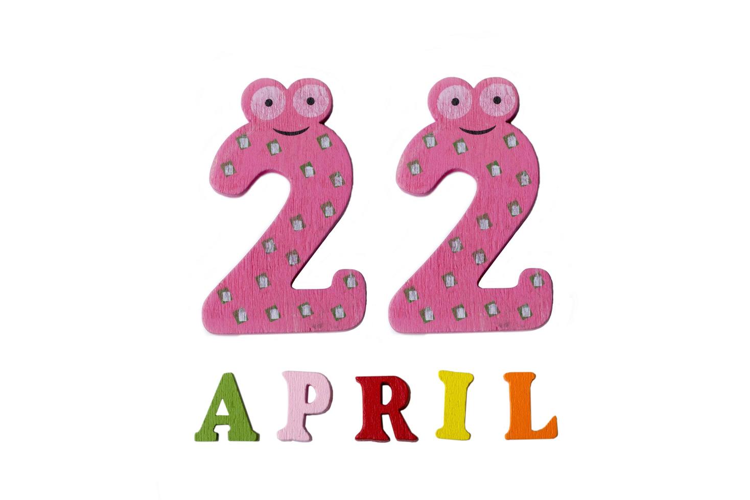 April 22, on a white background made of numbers and letters. photo