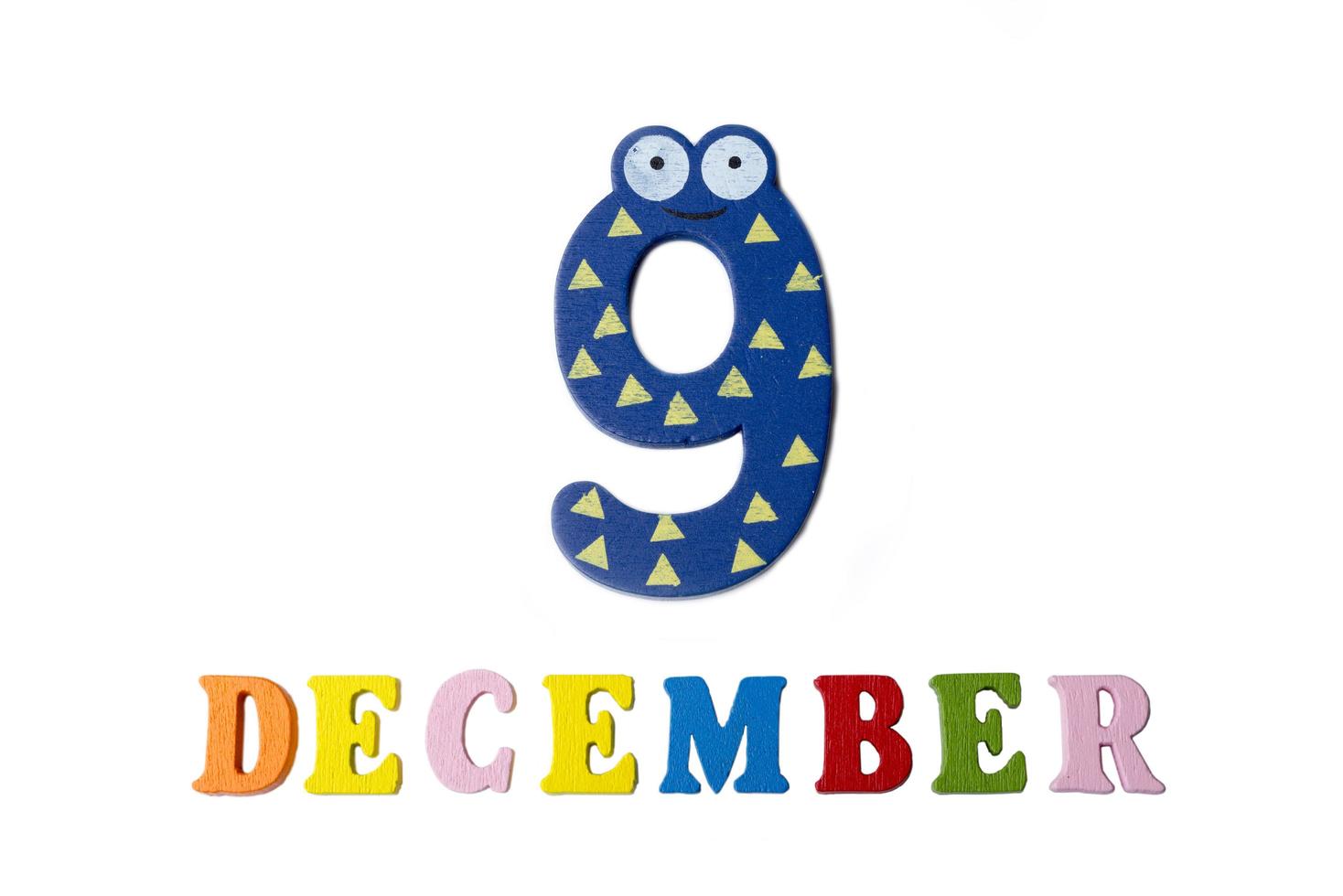 December 9 on white background, numbers and letters. photo