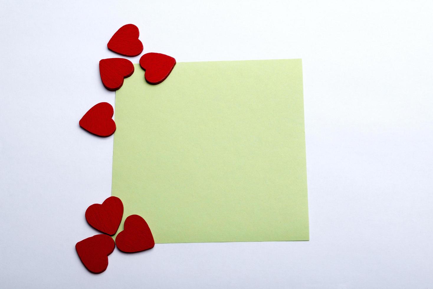 Sticker and hearts on a white background. photo