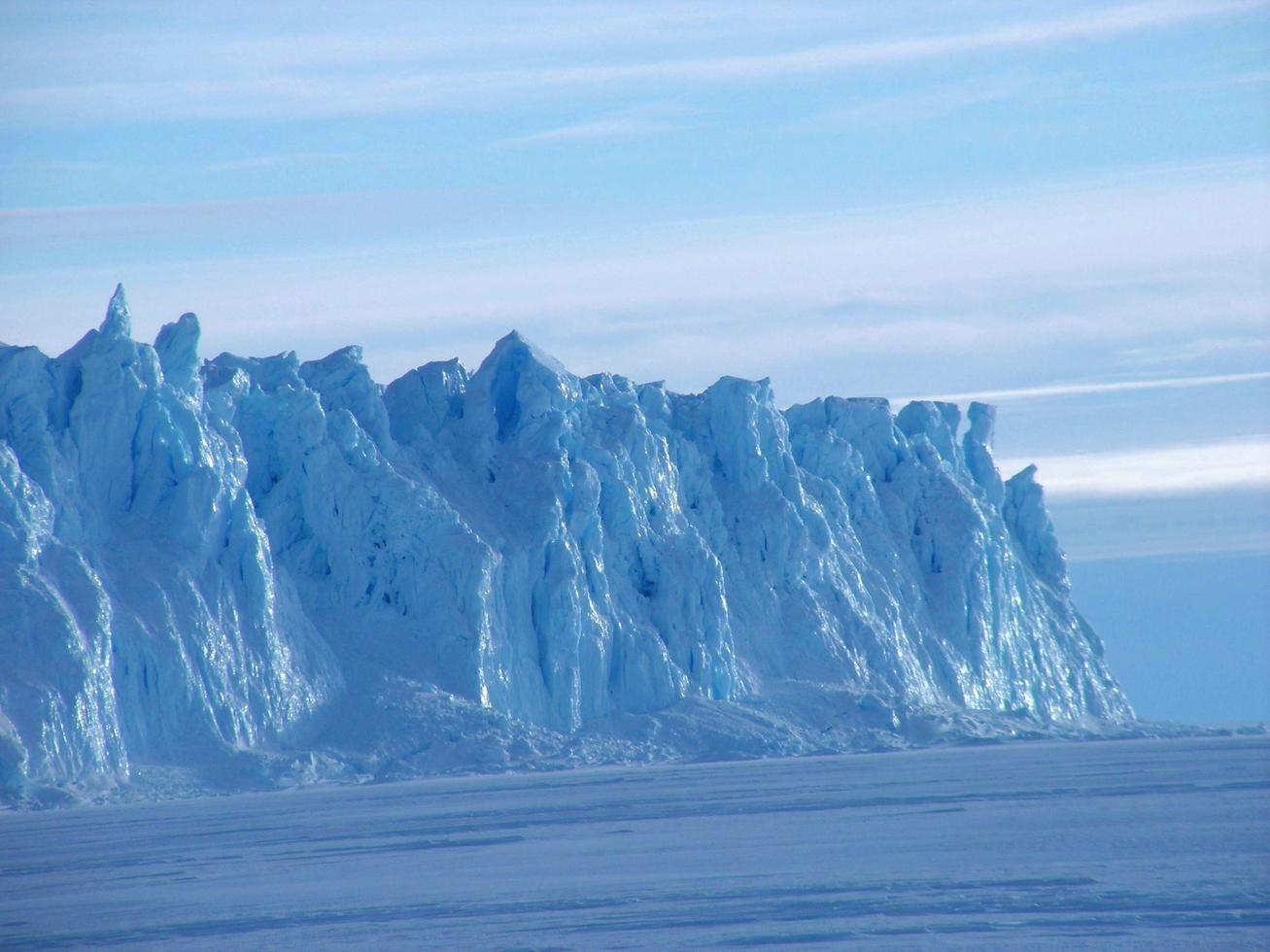 Antarctica endless ice fields icebergs in the sea photo