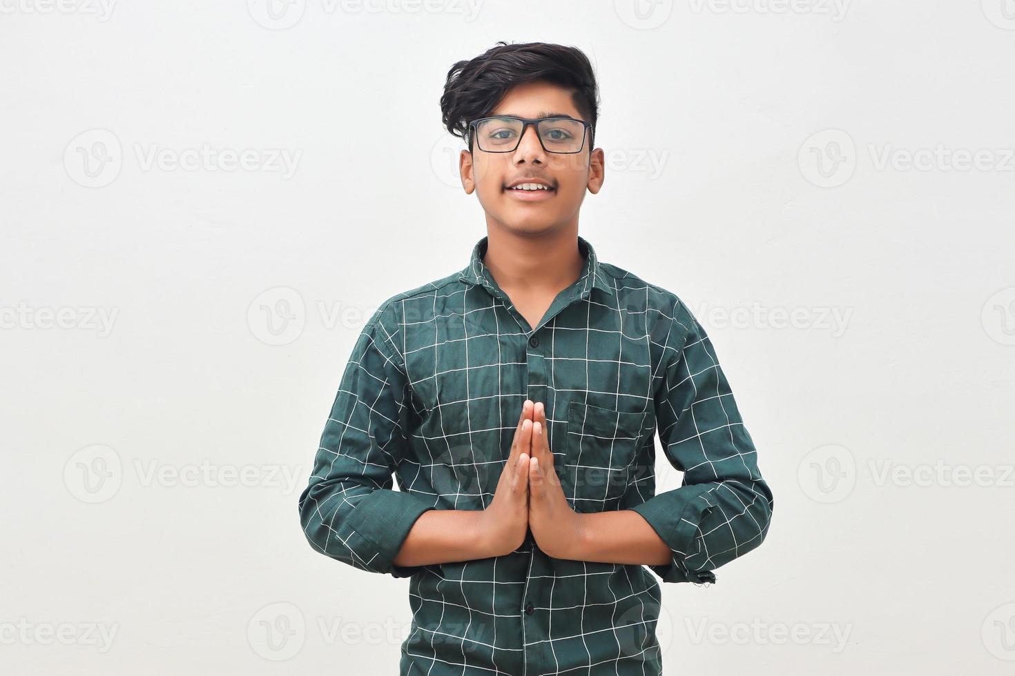 Young indian man with praying. photo