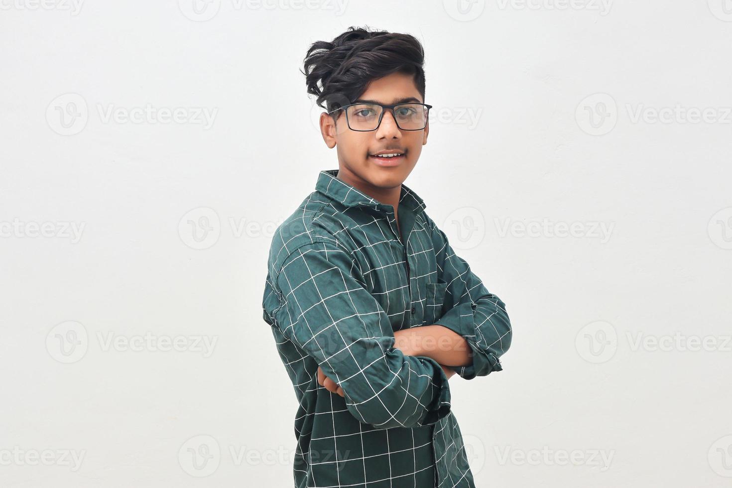 Young indian man with his arms crossed. photo