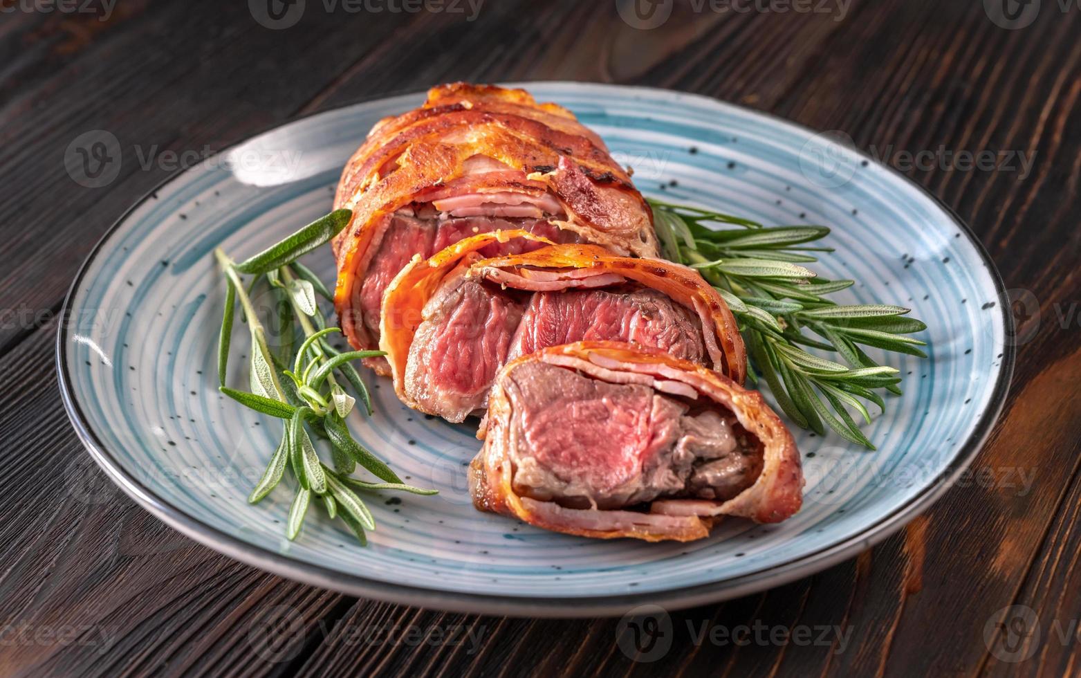 Bacon-wrapped beef steack photo