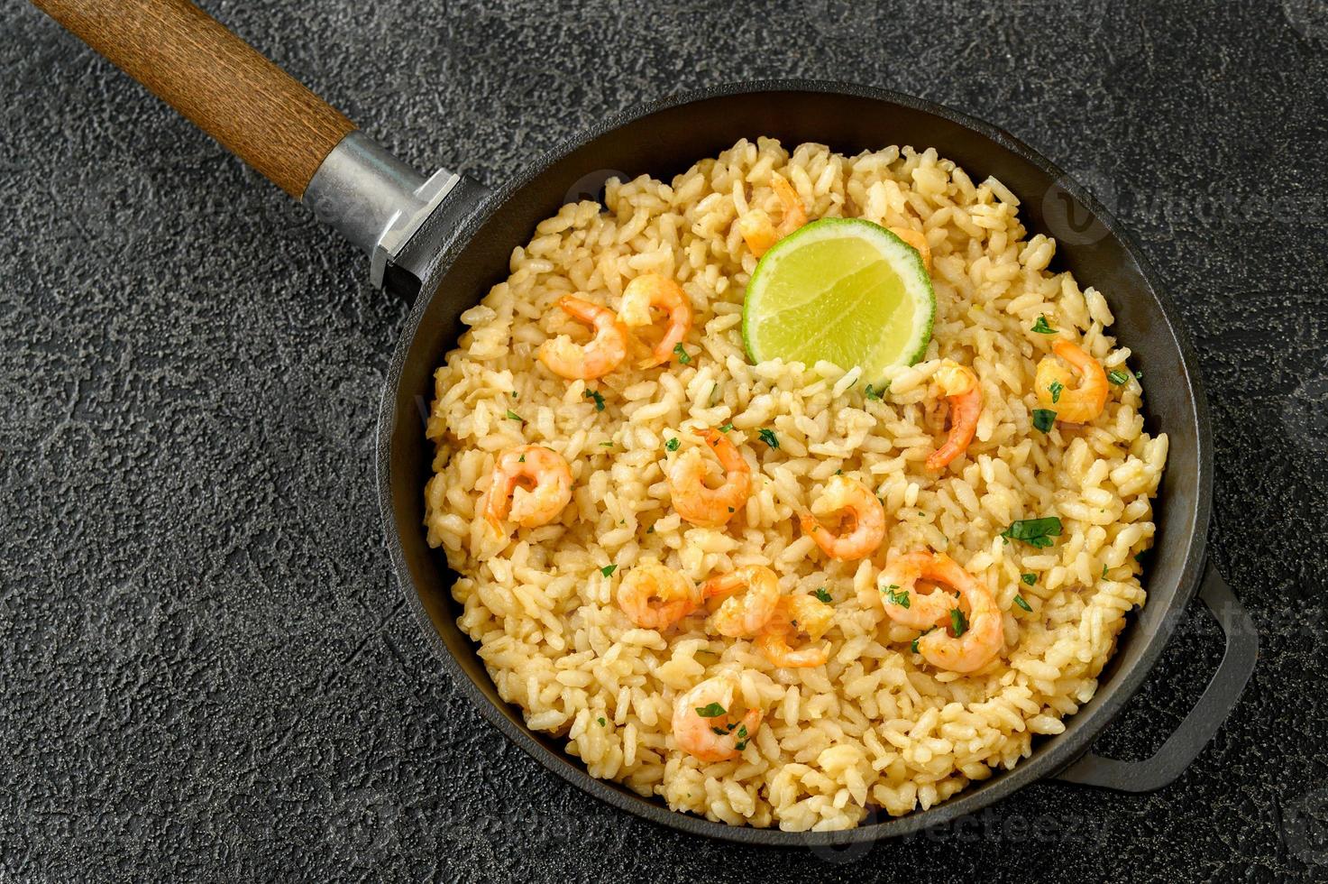 Portion of risotto with prawn photo