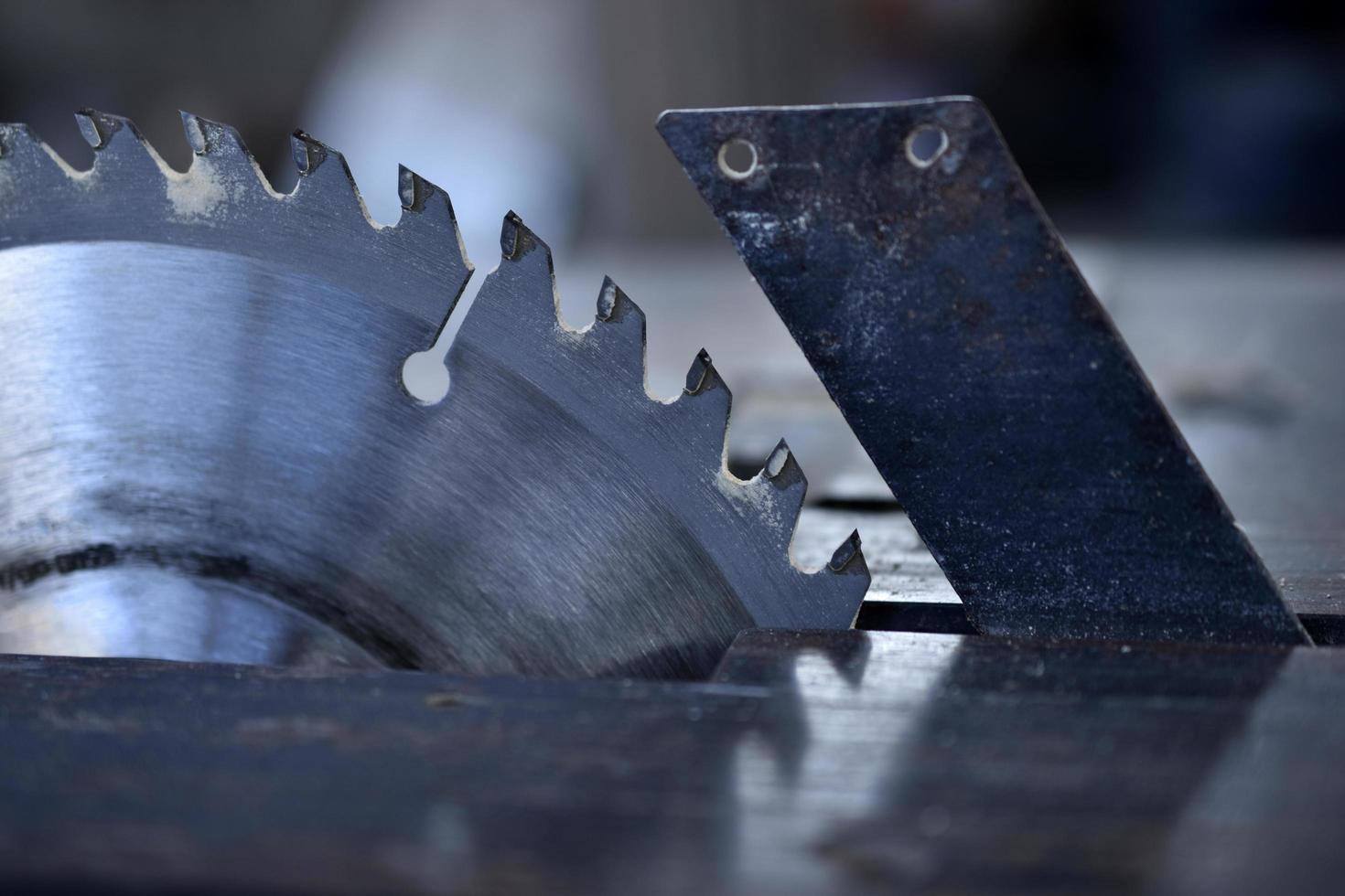 Silver circular saw in the garage at work photo