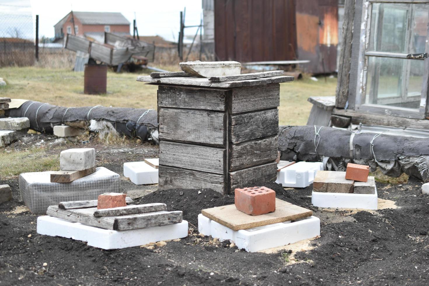 Wooden boxes for plant protection in winter photo