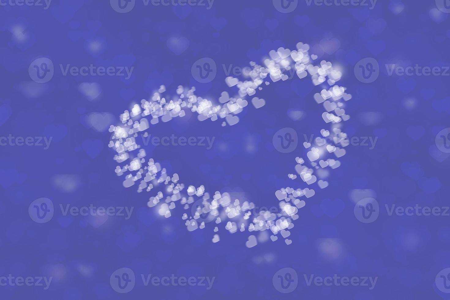 Heart bokeh very peri trendy color 2022 background for valentines day greeting card or wallpaper photo