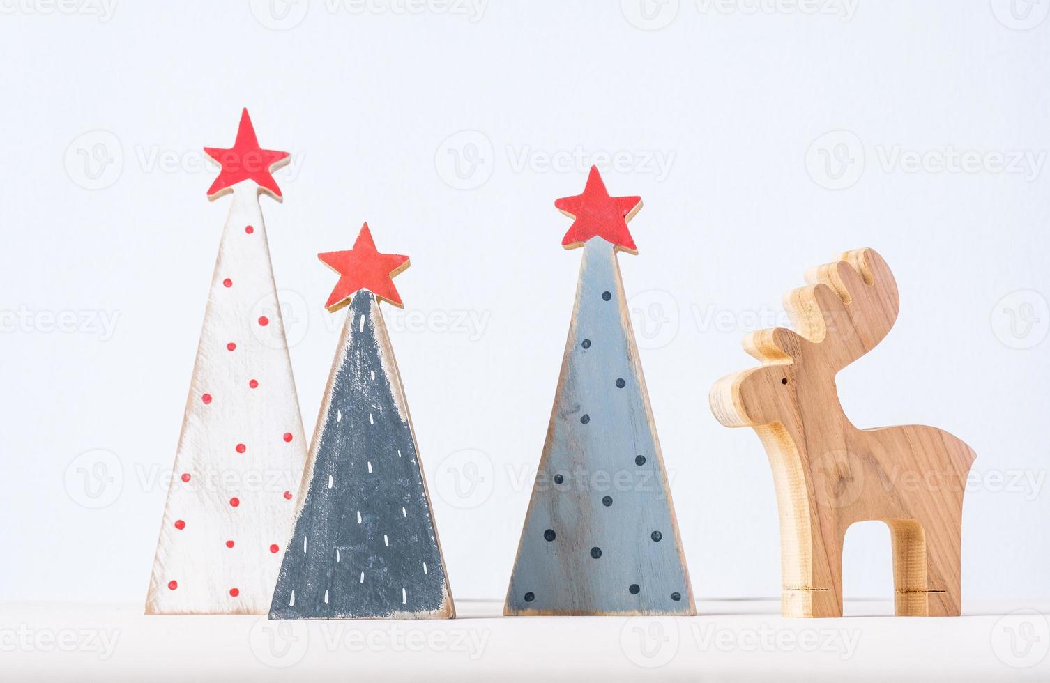 set of christmas wood block with bauble decoration on peace color table photo