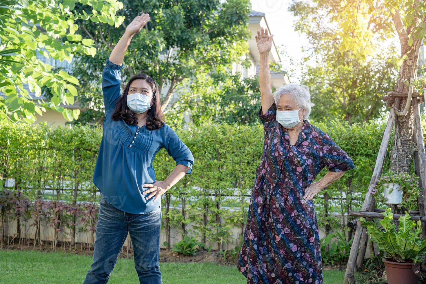 Asian senior or elderly old lady woman patient exercise with happy fresh enjoy in park, healthy strong medical concept photo