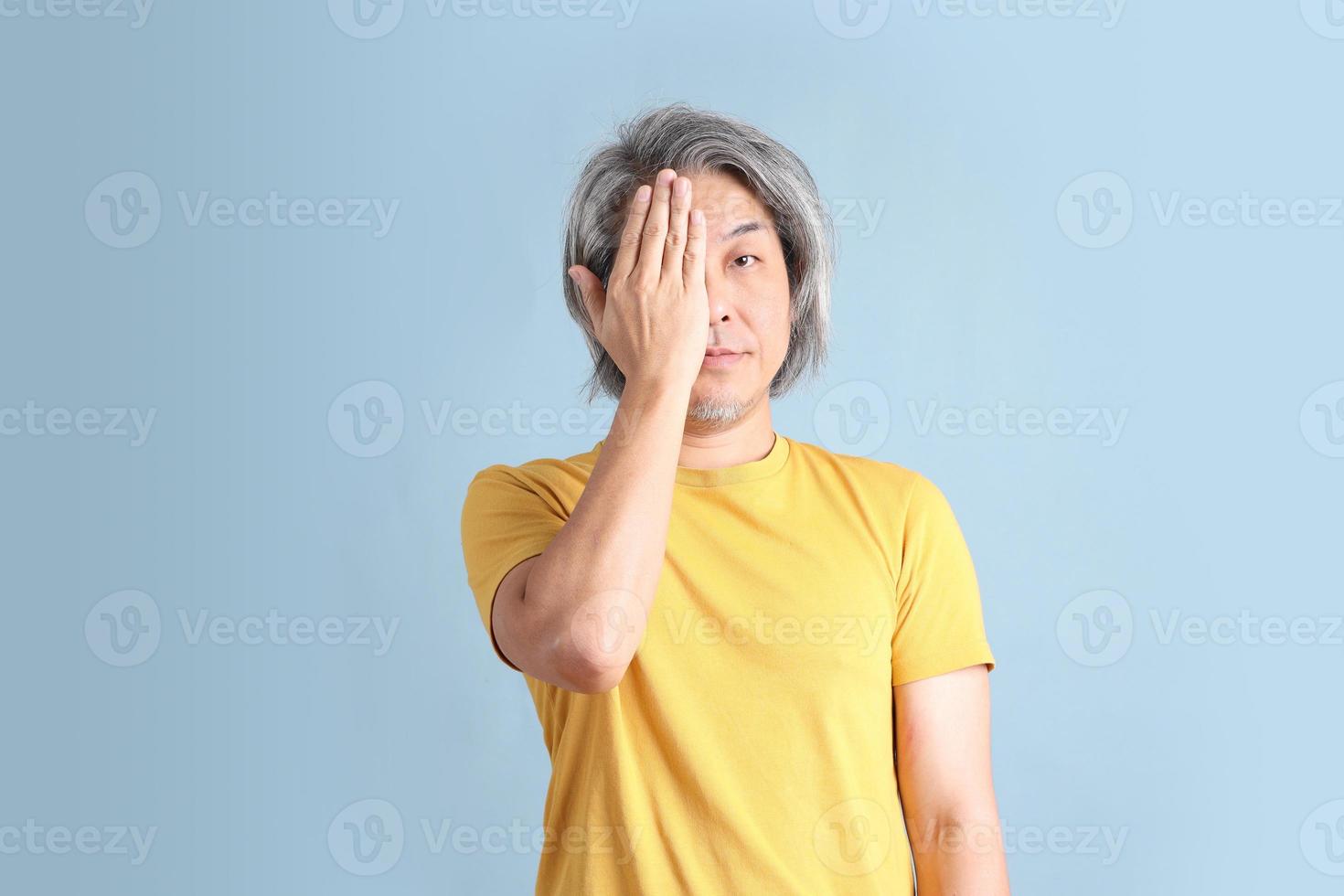 Asian Man with Yellow Tshirt photo