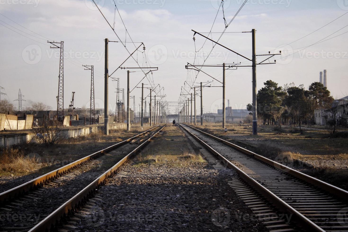 Evening scene with a railway. Railway going to infinity. photo