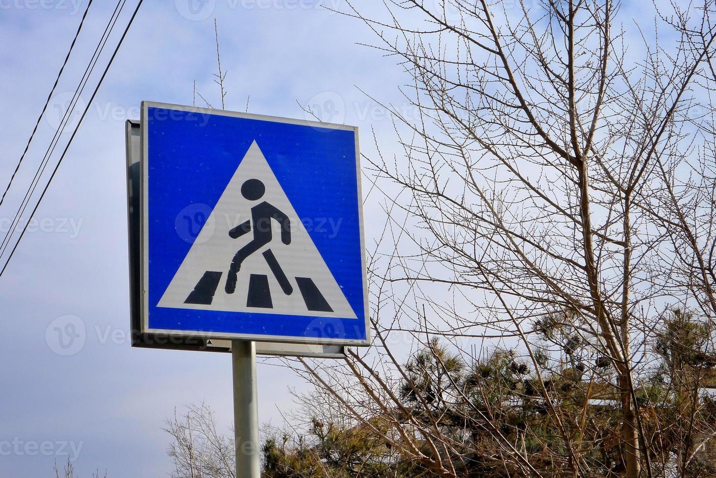 Zebra crossing road sign in the street. photo