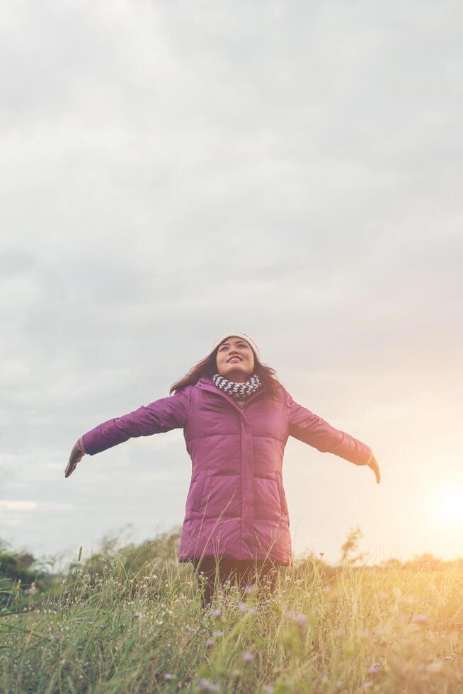 Silhouette of the woman freedom enjoy with fresh breeze while winter. photo