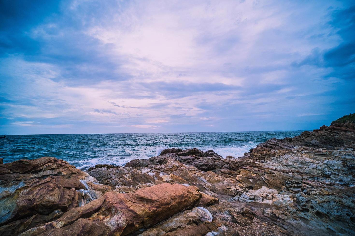 Sea Ocean with Smooth Wave and Rock landscape with blue sky ...