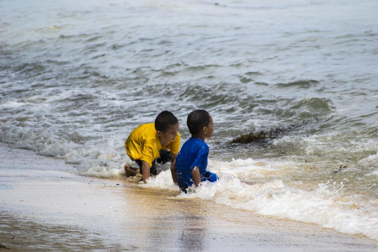 Sorong, West Papua, December 12th 2021. A Family having good time at the beach photo