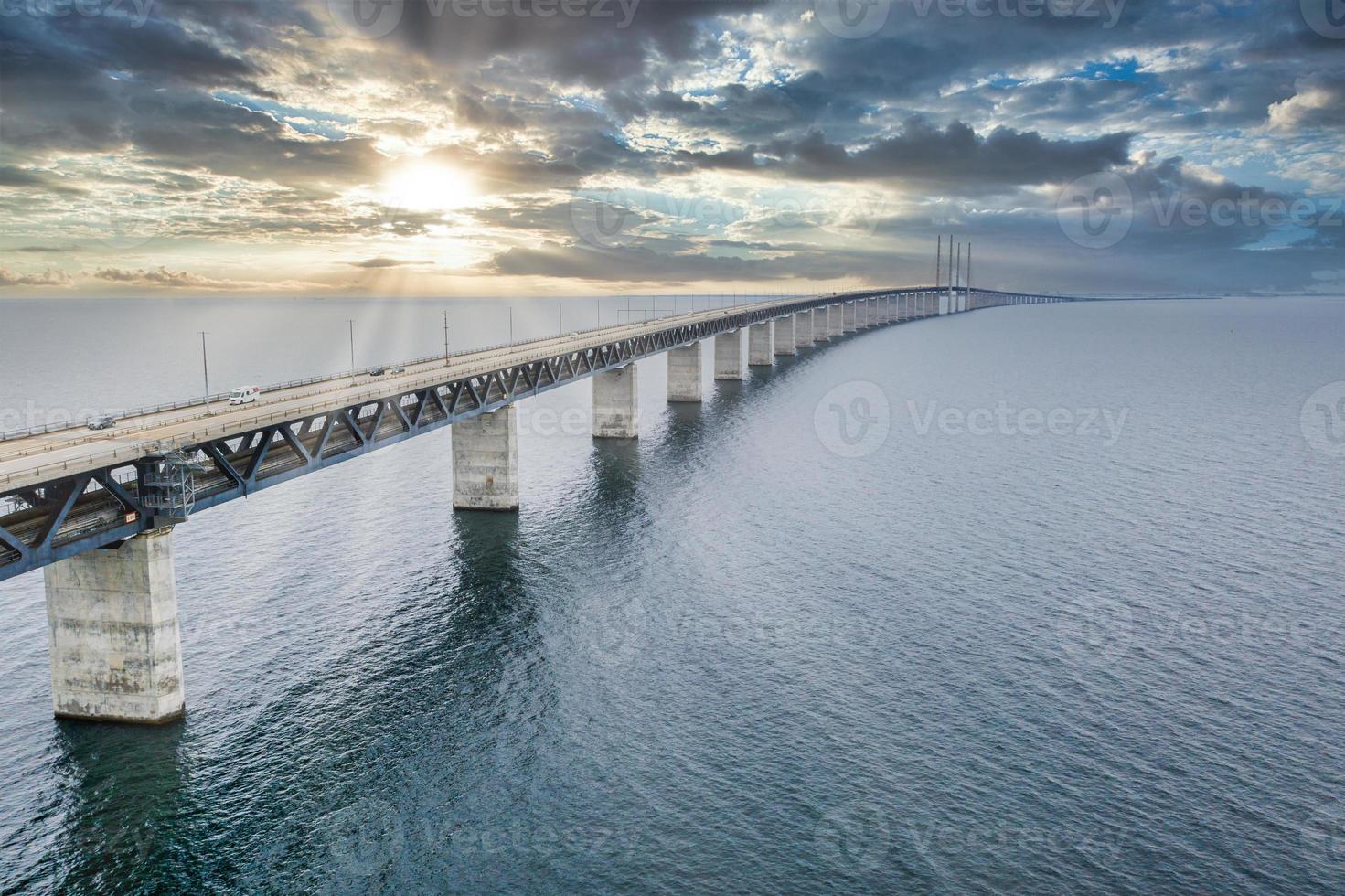 Panoramic view of Oresund bridge during sunset over the Baltic sea photo