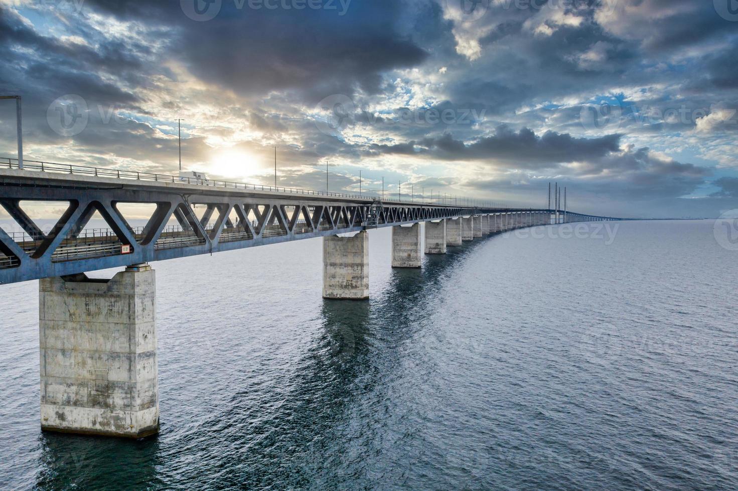 Panoramic view of Oresund bridge during sunset over the Baltic sea photo