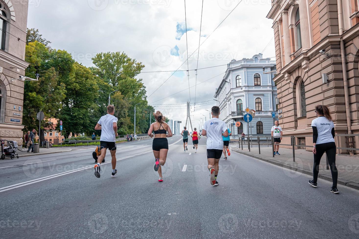 Large group man runners running marathon photo