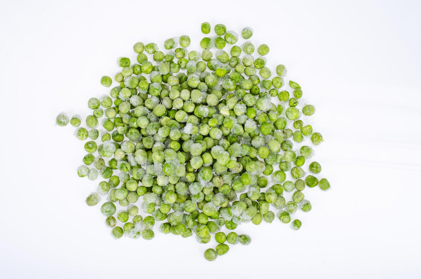 Frozen green peas, preservation of vitamins and vegetables. Studio Photo