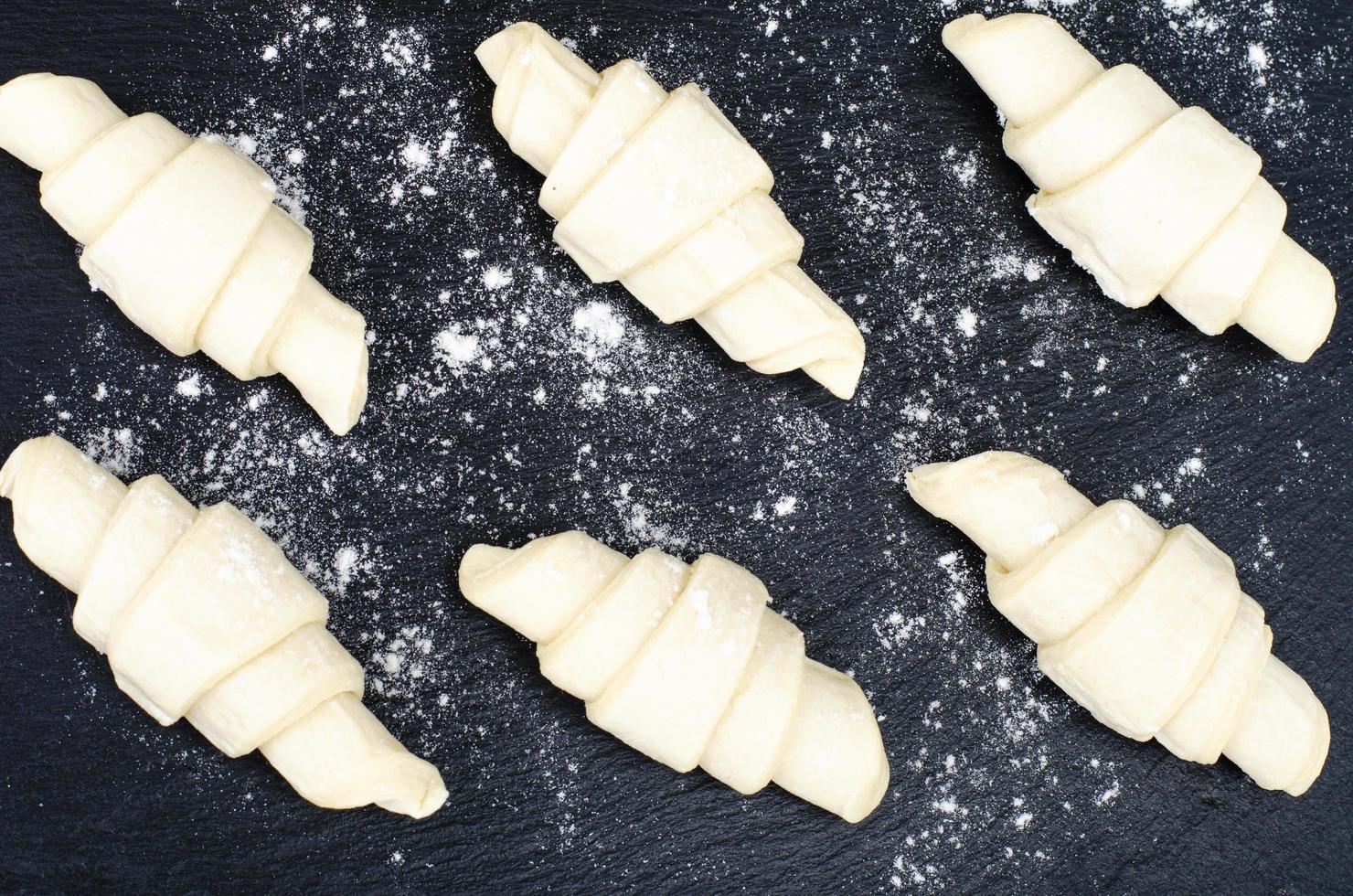 Puff pastry, frozen croissants on board. Studio Photo