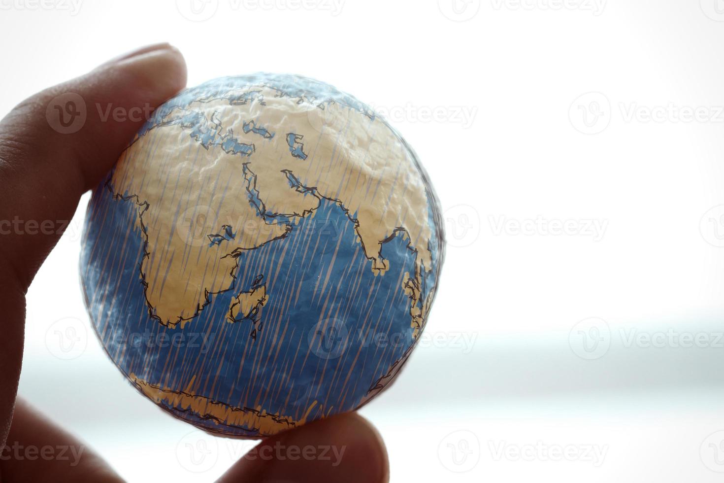 close up of businessman hand showing texture the world concept Elements of this image furnished by NASA photo