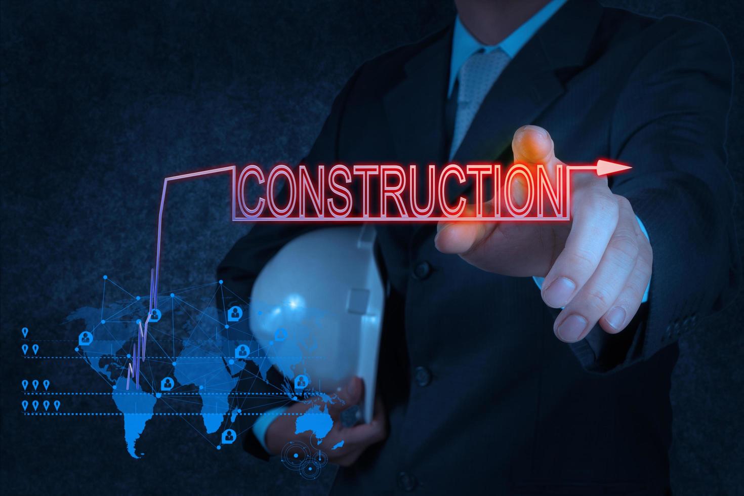 businessman hand pointing to construction photo