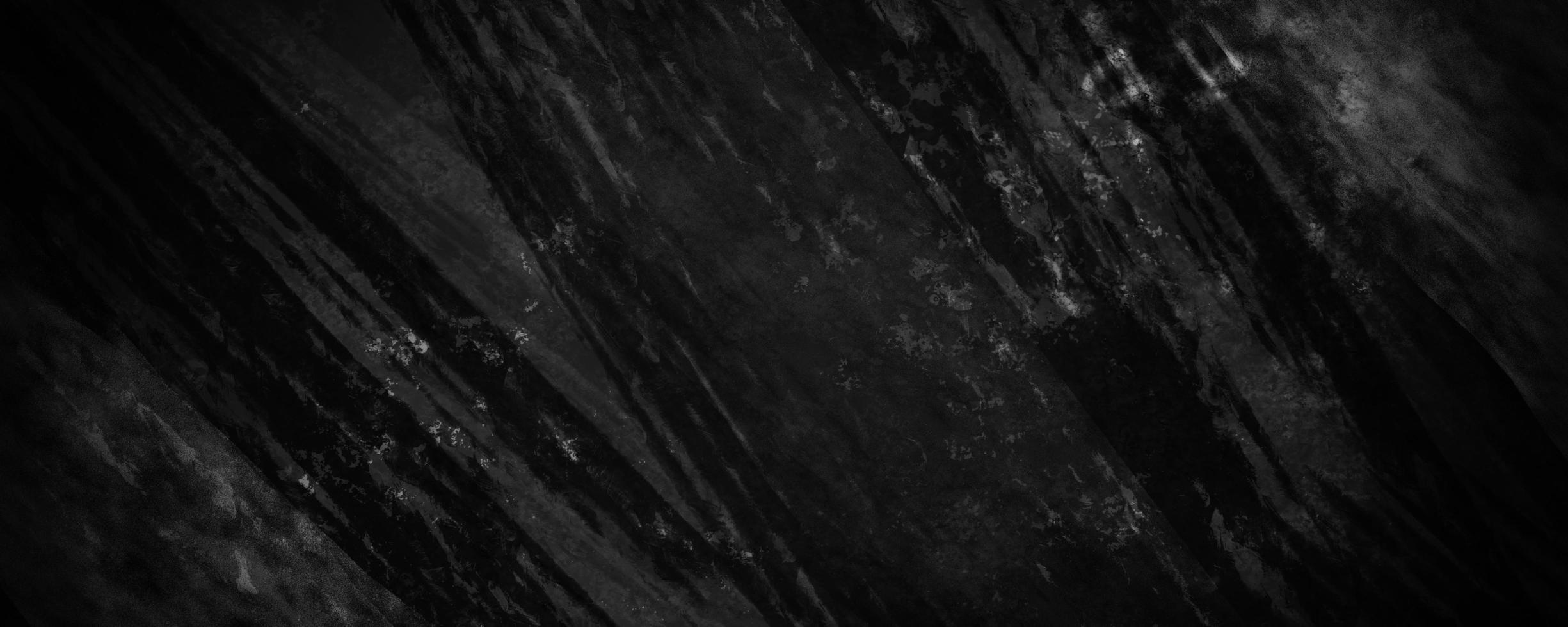 black concrete cement grainy and defocused background with dark gray cracks and crumpled wrinkles photo