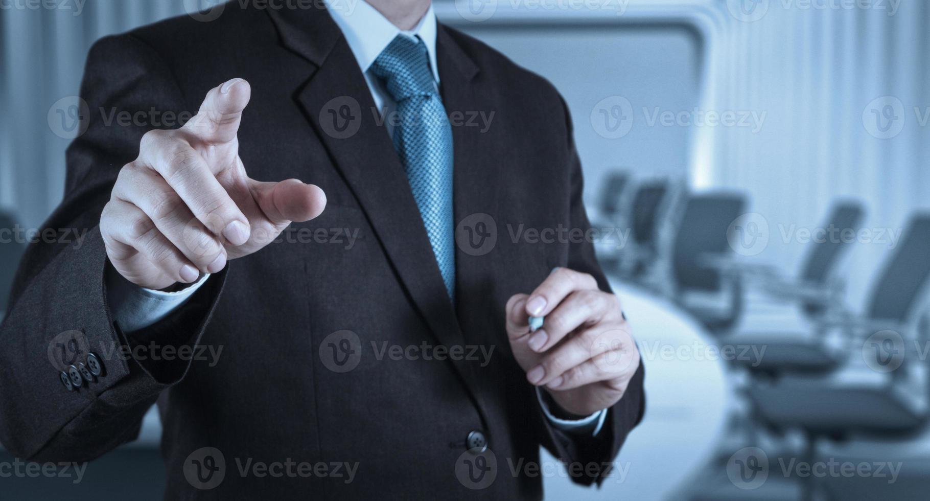 Businessman hand pressing an imaginary button photo