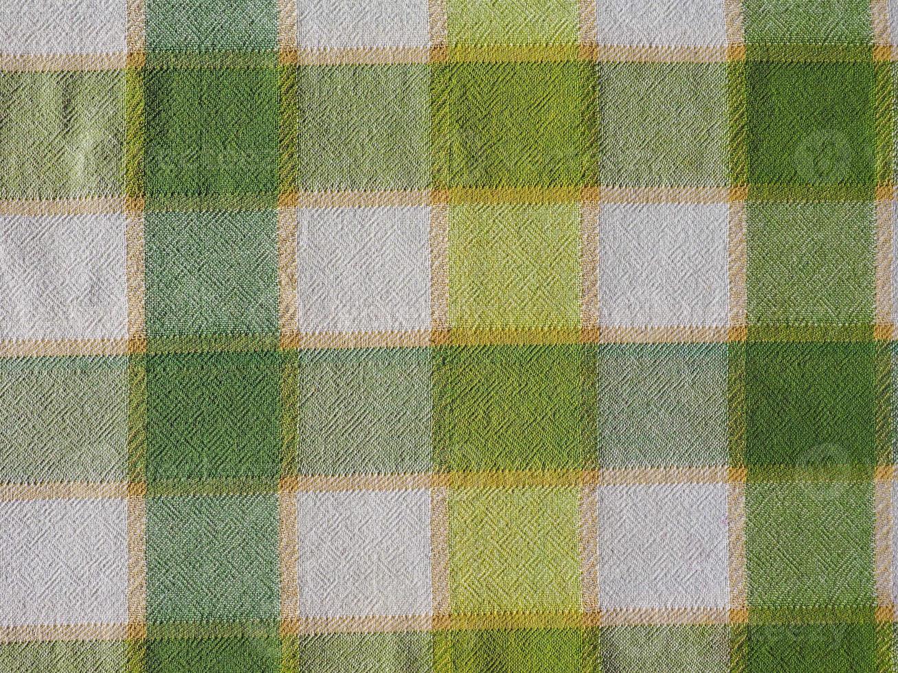 chequered green white fabric texture background photo